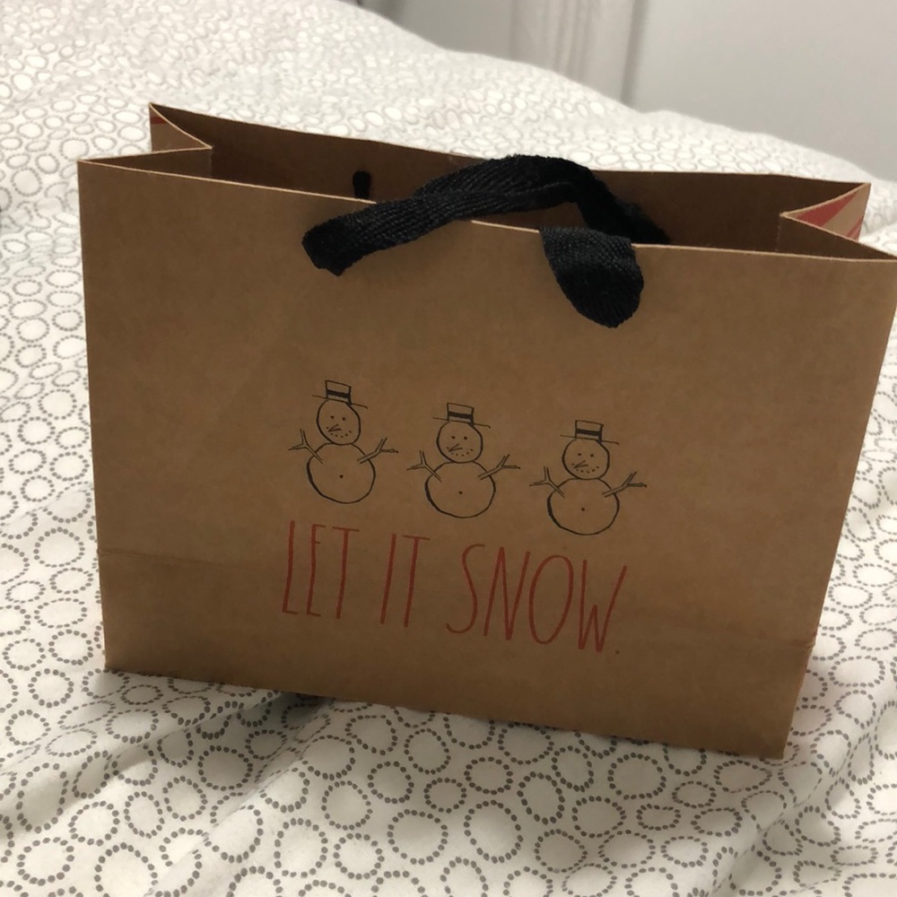 Free with 2 other Rae Dunn items. Small, paper gift bag. 8” wide.